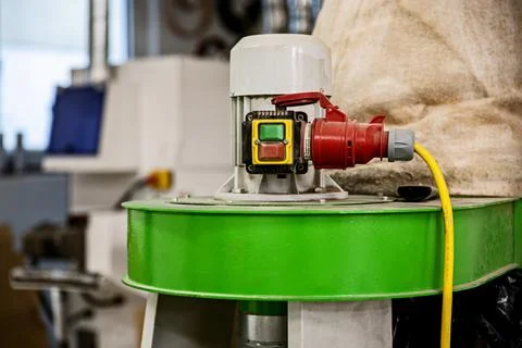 380 volt power plug. Machine with a three phase socket. Carpentry workshop. Stock Photos