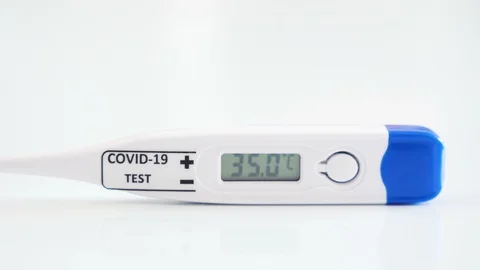 A 39 degree celcius temperature for a coronavirus or Covid-19 test Stock Footage 129463439
