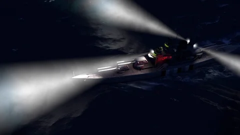 3d animation of a battleship in the open ocean by night with the searchlights on Stock Footage 103495867
