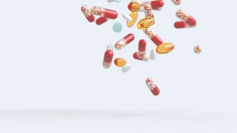 3D Animation of Colorful Pills slow motion falling down and landing. Stock Footage