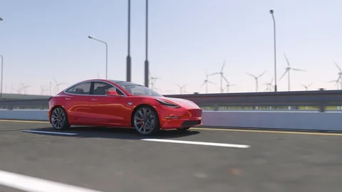 3d animation of an electric Tesla model 3 driving on highway Stock Footage