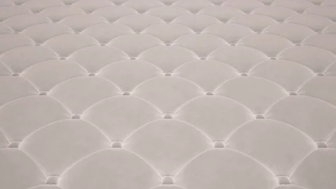 3D animation of the flight over a white quilted velvet surface. Looped video. Video stock 107123801
