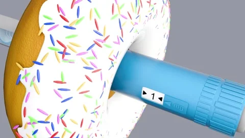 A 3d animation of GLP-1 injection pen passing through a sprinkle donut. Stock Footage 335940868