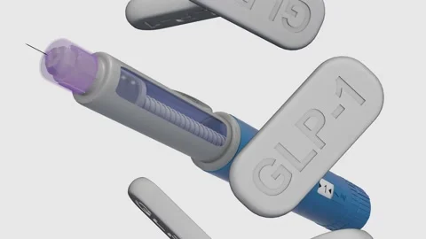 A 3d animation of GLP-1 injector pen and spinning  grey "GLP-1" tablets Stock Footage 340257335