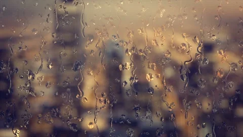 3d animation of rain drops on a window with buildings in the background Stock Footage 235650107