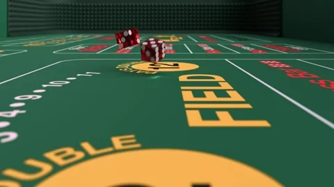 3d animation of two red dice as they roll in slow motion across a casino table Stock Footage 285646667