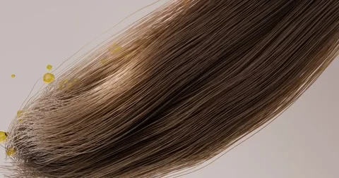 3D animation of the undulating movement of dark hair, surrounded by a care p Stock Footage 296420831