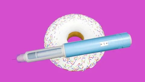 A 3d animation of white sprinkle donut and a GLP-1 drug injection pen Stock Footage 335975069