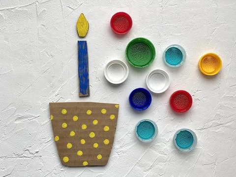 3d application training made of recycled cardboard and plastic lids, cake Stock Photos