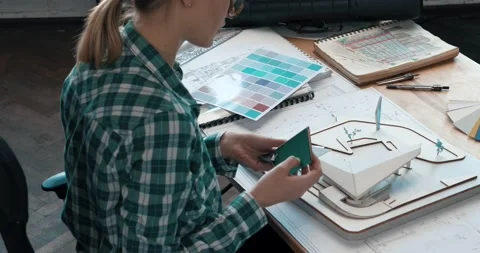 3d architect working in office with building 3D model. Engineer inspect building Vídeos de archivo 130354296