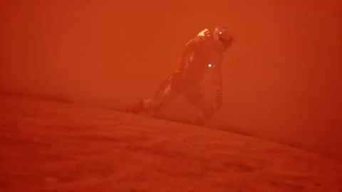 3D Astronaut in sandstorm mars environment Stock Footage 240076246