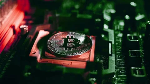 3D Bitcoin Cryptocurrency on Computer Motherboard Stock Footage 296044034