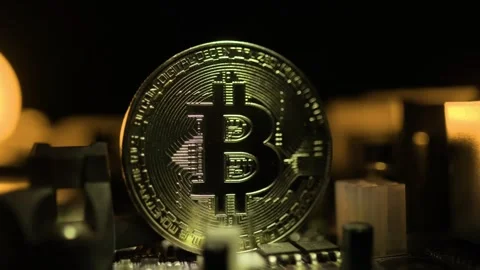 3D Bitcoin Cryptocurrency on Computer Motherboard Stock Footage 296044140