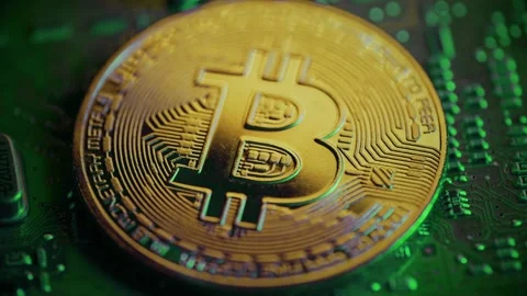 3D Bitcoin Cryptocurrency on Computer Motherboard Stock Footage 296044447