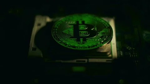 3D Bitcoin Cryptocurrency on Computer Motherboard Stock Footage 296044624