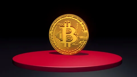 3D Bitcoin Rotating On A Red Podium Video stock 275420221