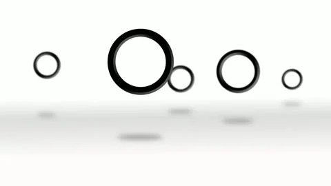 3D black circles floating on a white infinite background. Abstract Video stock 162070751