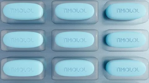 A 3d of blister packs oval shape pills labeled "TIMOLOL" Stock Illustration
