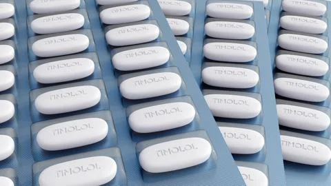 A 3d of blister packs oval shape pills labeled "TIMOLOL" Stock Illustration