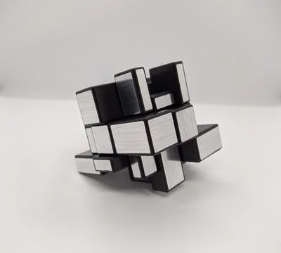 3D brain teaser on white background side view Stock Photos