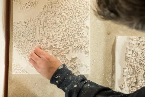 3D City Map Plaster Model Being Detailed Stock Photos