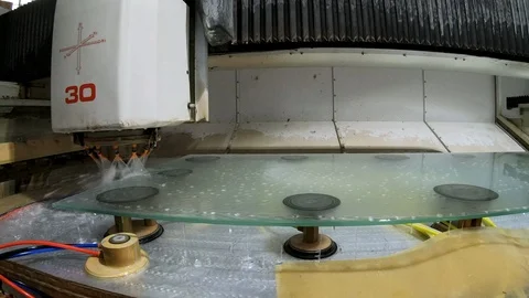 3D CNC machine. Milling glass panel with an industrial CNC machine. Water Video stock 124156654