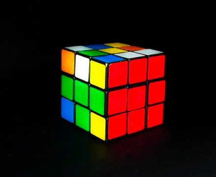 A 3D combination puzzle on an isolated black background Stock Photos