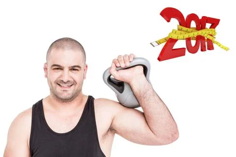 3D Composite image of bodybuilder lifting heavy kettlebell Stock Photos