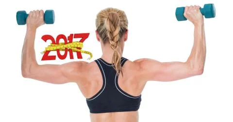 3D Composite image of female bodybuilder holding two dumbbells with arms up Stock Photos