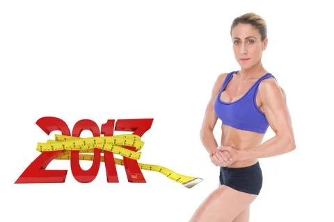 3D Composite image of strong blonde posing and looking at camera Stock Photos