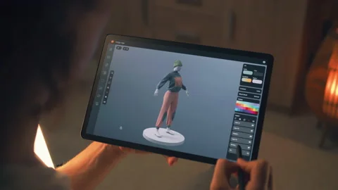 3D designer creating clothes in design app Stock Footage 211799490