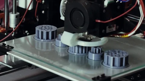 3D diy printer printing plastic mechanical parts Stock Footage 74659117