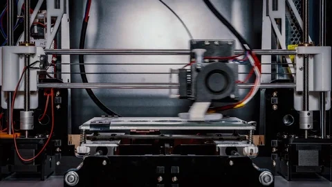 3D diy printer printing plastic mechanical parts in timelapse Stock Footage 74663246