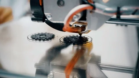 3D diy printer printing plastic mechanical parts in timelapse.An open source diy Stock Footage 82546444