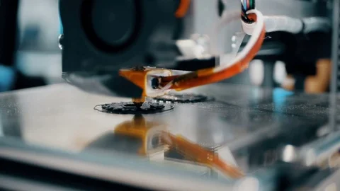 3D diy printer printing plastic mechanical parts in timelapse.An open source diy Stock Footage 82556389