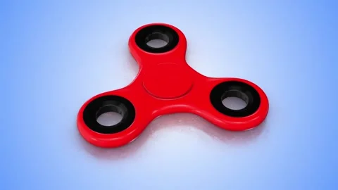 3D Fidget Spinner Rotating on a Blue Reflective Floor. Fidget Spinner 3D. 4K Stock Footage 284620965