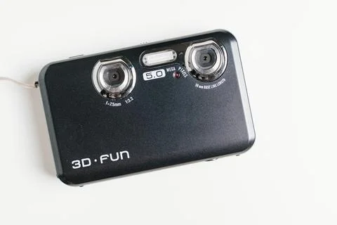 3D Fun black stereoscopic camera on a white background. A camera with two lenses Stock Photos