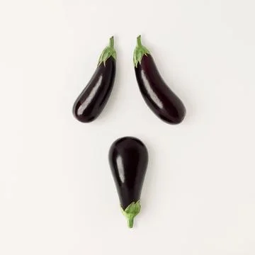 3D ghost face made with eggplants on a white background - creative Halloween con Stock Illustration