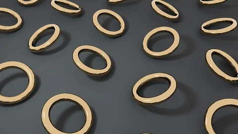 3D gold torus rotating on dark surface. Abstract creative 4k seamless loop anima Stock Footage 104749722