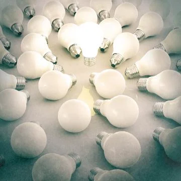 3d growing light bulb standing out from the unlit incandescent bulbs Ilustración de archivo