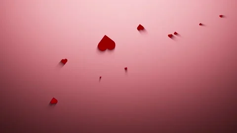 3d Hearts glide across the red copy space surface Stock Footage 229764497