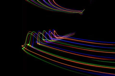 3D illustration. Abstract patterns of lights on black background. Lines of co Stock Illustration