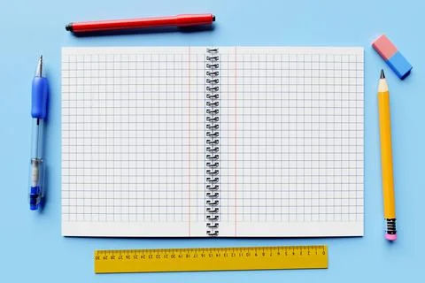 3d illustration, an open checkered notebook, a blue pen,  pencil, rubber, rul Stock Illustration