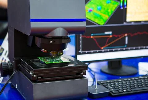 3D laser microscope measuring PCB board. Stock Photos