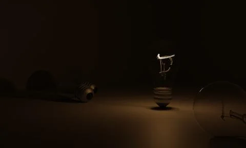 3D light bulb in the dark Stock Photos