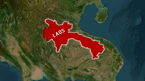 3D Map Animation Highlighting Laos with Text Overlay and Waving National Flag Stock Footage 342256335