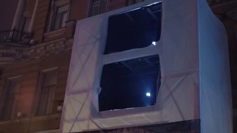 3d mapping projector working outdoors. Beam of light from projector Stock Footage 80311101