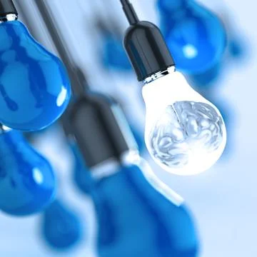 3d metal human brain in a light bulb as creative concept Illustration
