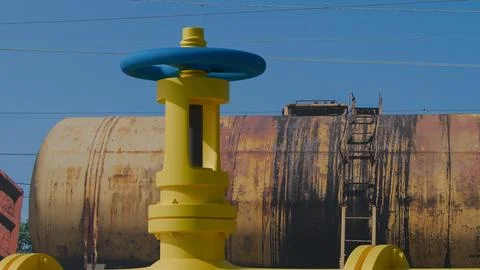 3d model of a gas pipe with a valve in the colors of the Ukrainian flag, a .. Stock Photos
