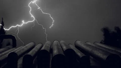 3D model of pipes against the background of lightning in the sky, fuel indust Stock Photos